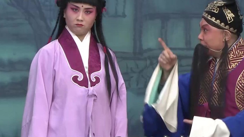京剧《三娘教子》录像截帧:青衣扮王春娥与老生扮薛保对戏